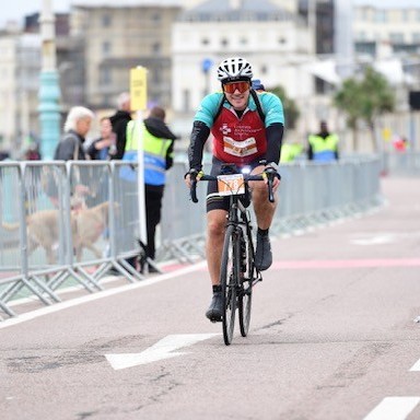 Adam cycling from London to Brighton