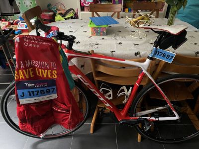 Fabio holding his RideLondon bike in 2021