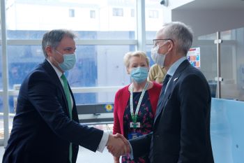 Bob meeting Minister for Health, Ed Argar, at the helipad opening