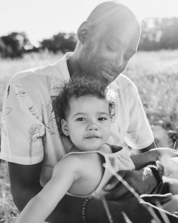 Leon cuddling his daughter Georgie