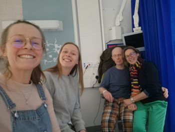 Frank in the major trauma ward with his wife and daughters