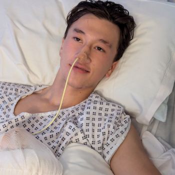 Phoenix conscious in a hospital bed