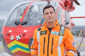 Paramedic Mike in front of the helicopter