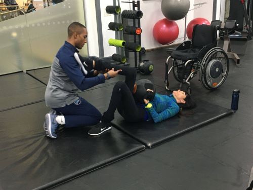 Vaiva working with her personal trainer