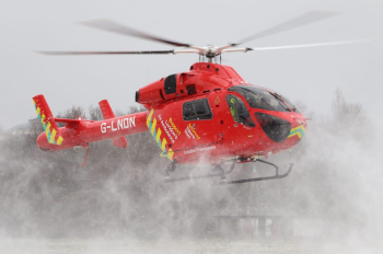 London's Air Ambulance Charity's helicopter landing in snow