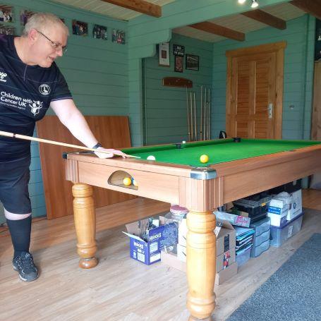 Matt playing pool to raise money for London's Air Ambulance Charity