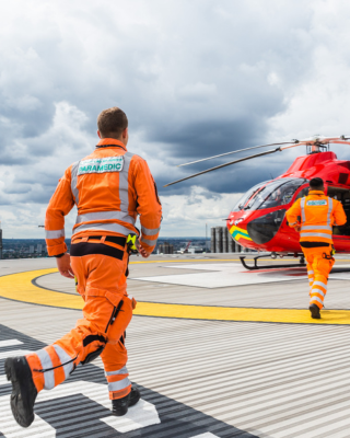 Paramedic running to London's Air Ambulance Helicopter