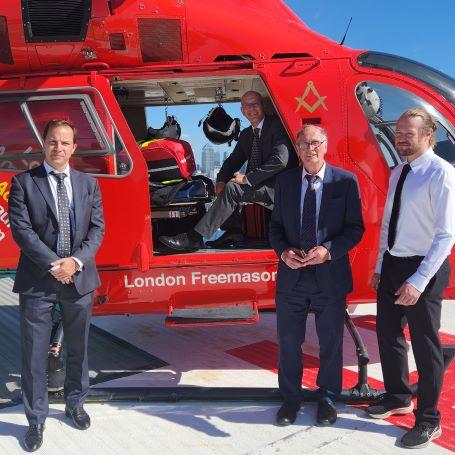 Some Freemasons visiting London's Air Ambulance Charity's helipad