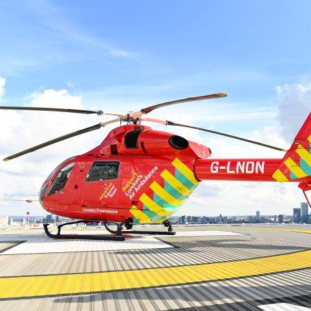 London's Air Ambulance Charity's red helicopter on the helipad