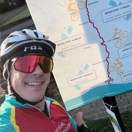 Adam, in his cycling jersey for London's Air Ambulance Charity