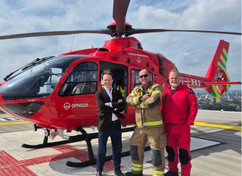 The Mayor of Kensington and Chelsea on our helipad with the helicopter and members of our operational crew