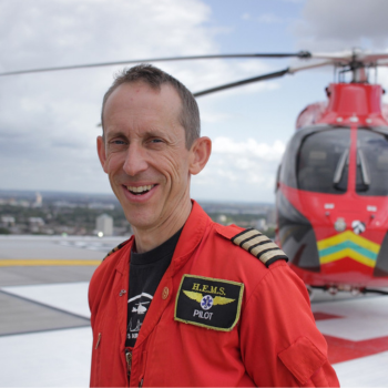 Captain Dave Rolfe in his flight suit on our helipad