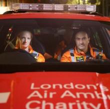 Paramedic and Doctor sat in Medic 3 car